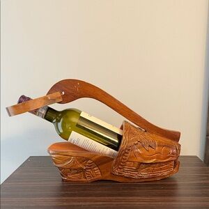 Wooden Polynesian clog shoe wine holder